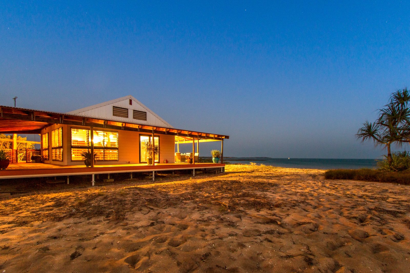 View of Master Pearlers Private Retreat, showing it's seclusion but also it's close proximity to the clear, blue waters of Cygnet Bay.