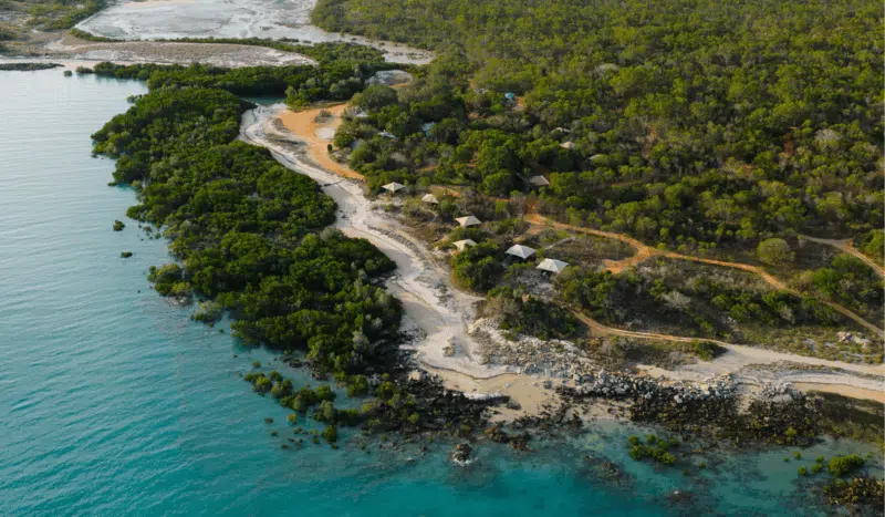 Seven accommodation sites sit nestled between native Australian shrubs and trees and a few steps away from the turquoise waters of Cygnet Bay.