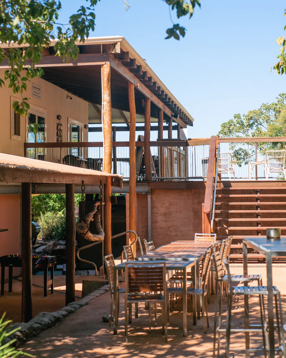 The beer garden in the morning, over looking the infinity pool on a warm day.